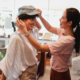 teen girls in a store trying on a hat