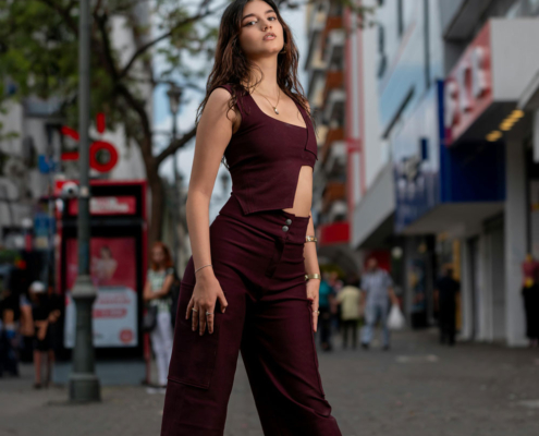 pretty teen girl posing in street