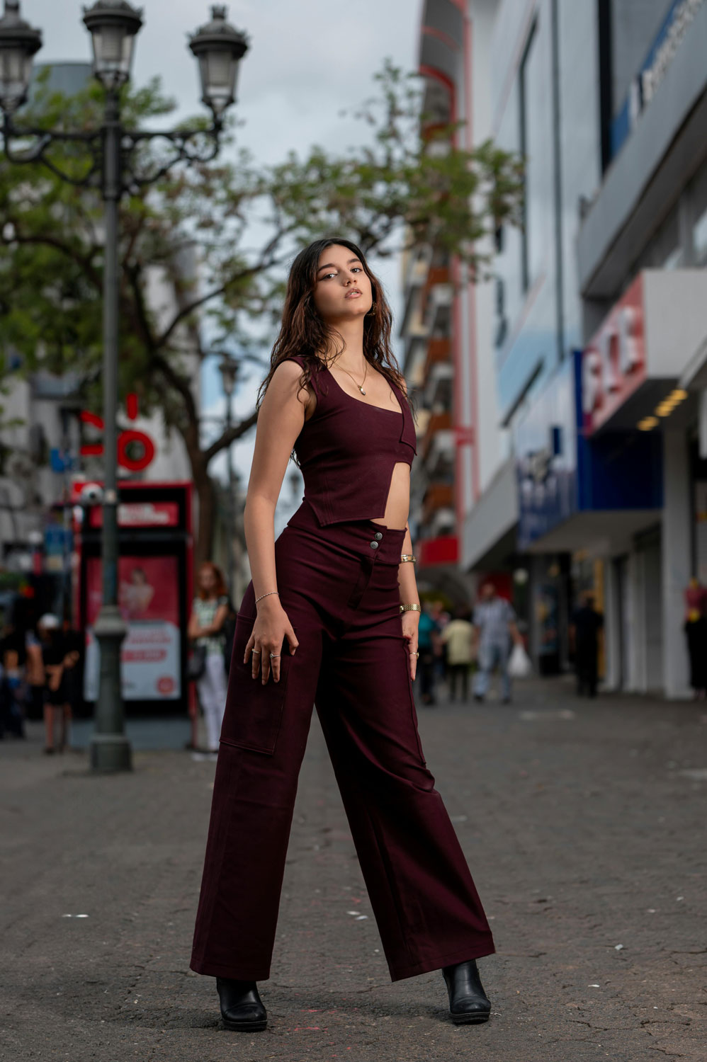 pretty teen girl posing in street